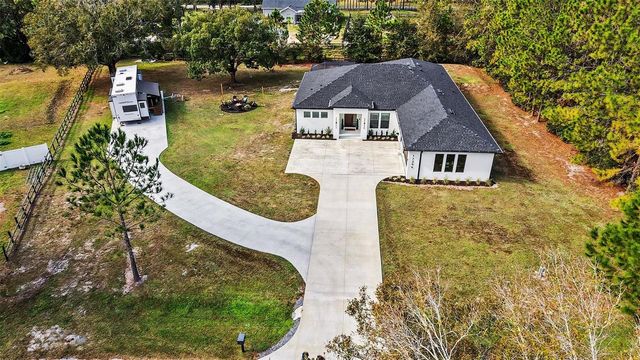 17296 RAINTREE ROAD, Lutz, FL 33558