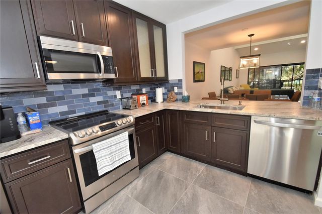 1508 PELICAN COVE ROAD GR233, Sarasota, FL 34231