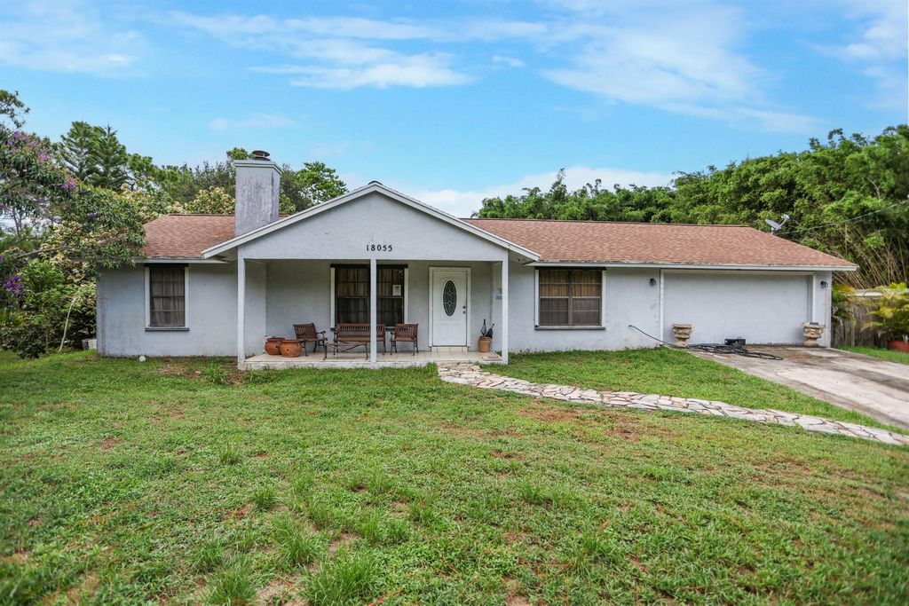 18055 W Sycamore Drive, The Acreage, FL 33470