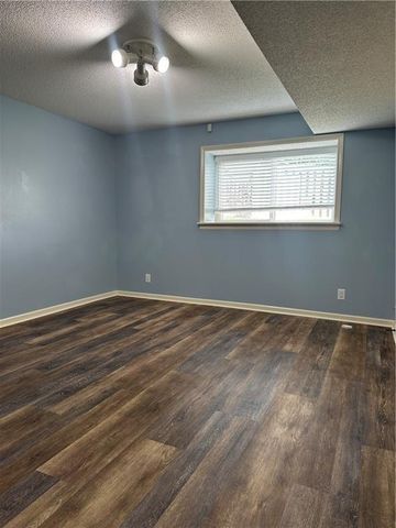 208 N Pacific Court, Raymore, MO 64083