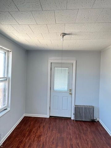 44-11 65th Street, Woodside, NY 11377