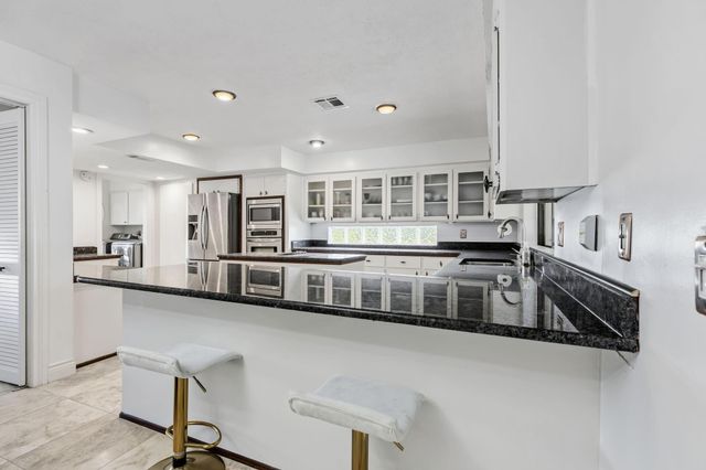 15703 Winding Moss Drive, Houston, TX 77068