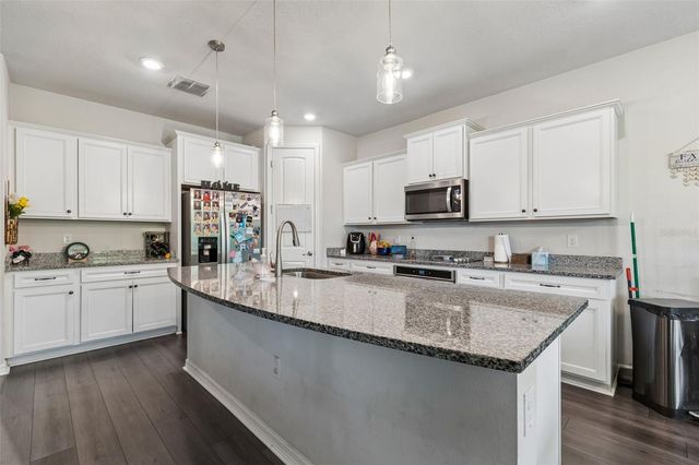 7604 POOL COMPASS LOOP, Wesley Chapel, FL 33545