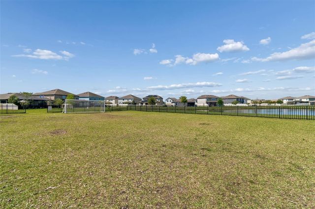 7604 POOL COMPASS LOOP, Wesley Chapel, FL 33545