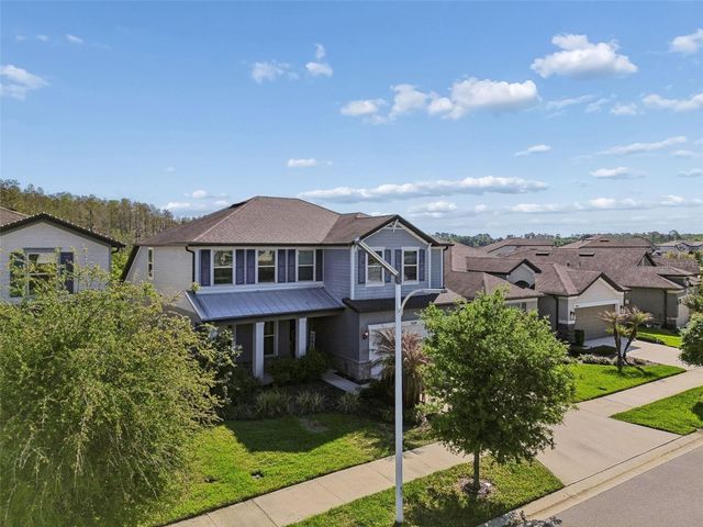 7604 POOL COMPASS LOOP, Wesley Chapel, FL 33545