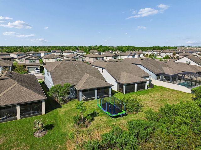 7604 POOL COMPASS LOOP, Wesley Chapel, FL 33545