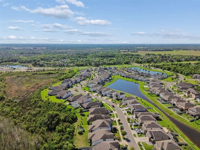 7604 POOL COMPASS LOOP, Wesley Chapel, FL 33545