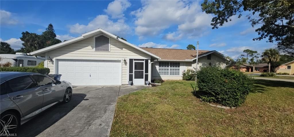 509 E 6th ST, Lehigh Acres, FL 33972