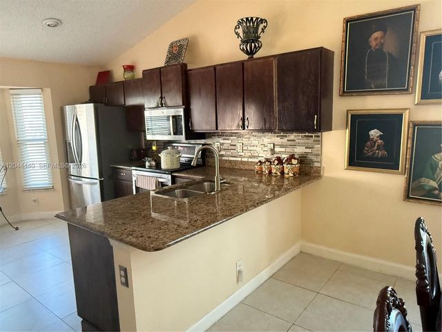 2006 White Coral Crt., Wellington, FL 33414