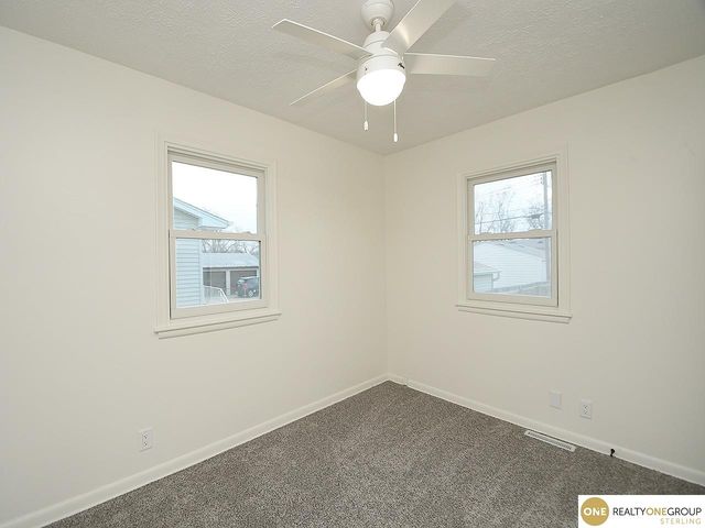 1005 Cachelin Drive, Carter Lake, IA 51510