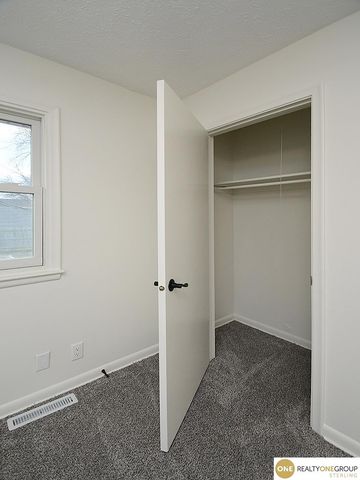 1005 Cachelin Drive, Carter Lake, IA 51510