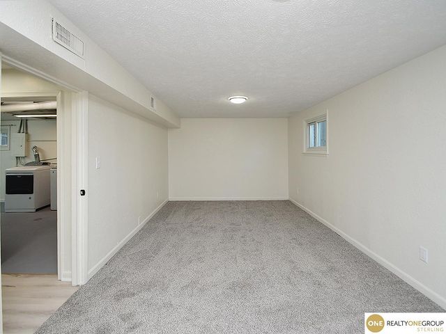 1005 Cachelin Drive, Carter Lake, IA 51510