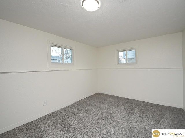 1005 Cachelin Drive, Carter Lake, IA 51510