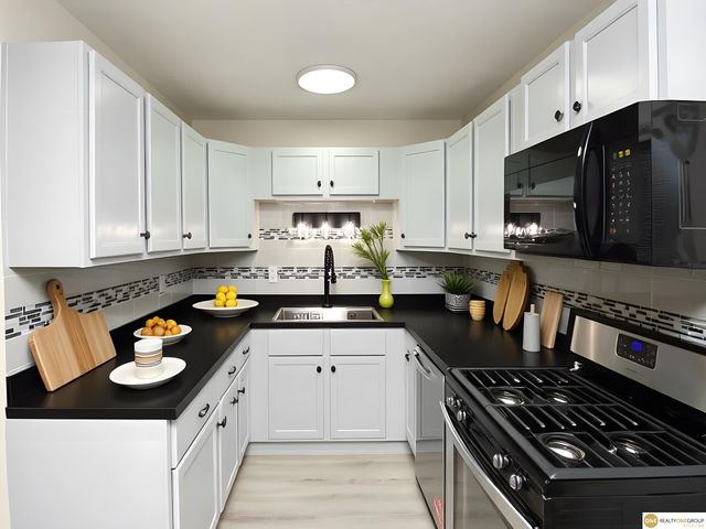 1005 Cachelin Drive, Carter Lake, IA 51510