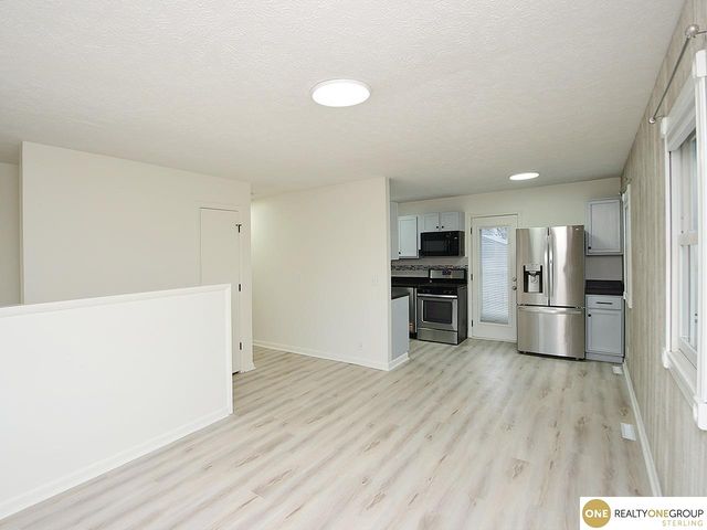 1005 Cachelin Drive, Carter Lake, IA 51510