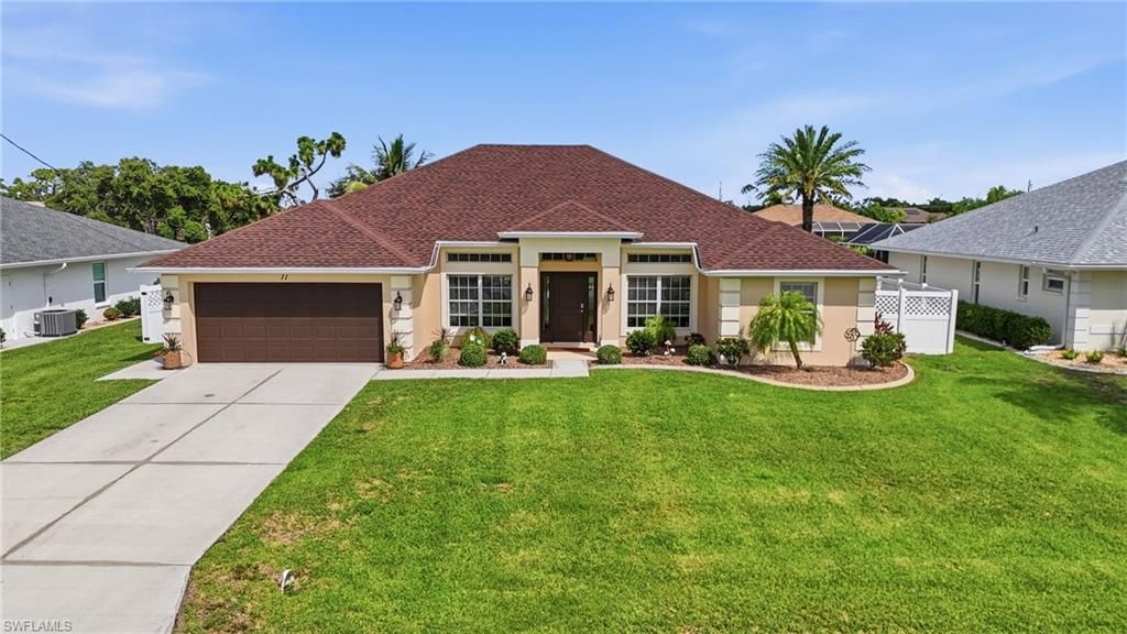 11 Medalist LN, ROTONDA WEST, FL 33947 — exterior
