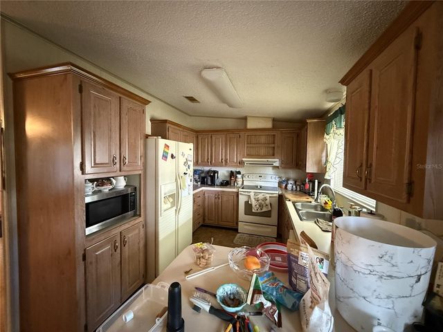 8634 TREASURE ISLAND ROAD, Leesburg, FL 34788