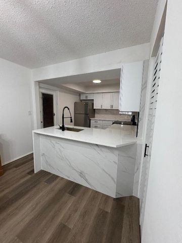 1150 E Sample Road E 312, Pompano Beach, FL 33064