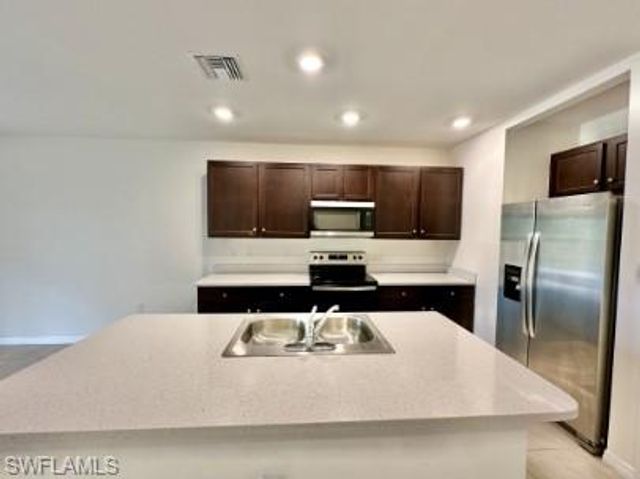15257 Wildflower CIR, Naples, FL 34119