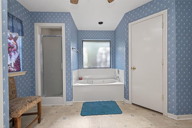 4906 Pleasure Lake Lane, Willis, TX 77318