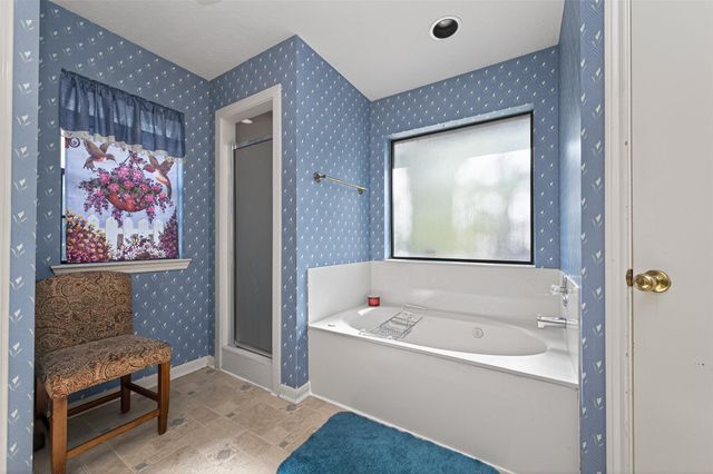 4906 Pleasure Lake Lane, Willis, TX 77318