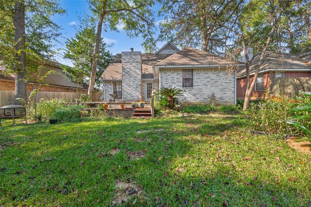 4906 Pleasure Lake Lane, Willis, TX 77318