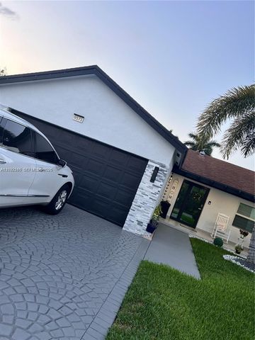 9571 NW 52nd Street, Sunrise, FL 33351