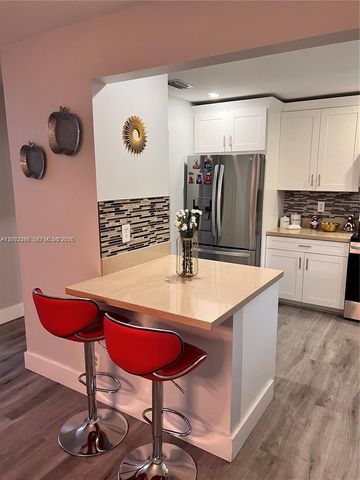 9571 NW 52nd Street, Sunrise, FL 33351