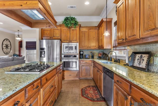 14630 Wisteria Lakes Dr, Central, LA 70818