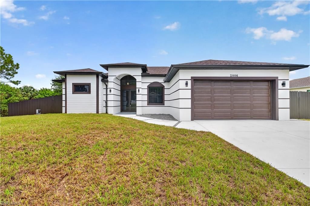 2806 Connie AVE N, LEHIGH ACRES, FL 33971 — photo 2