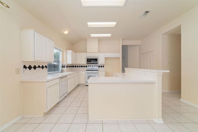 10011 Redoak Pass Lane, Houston, TX 77064