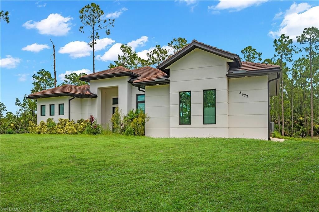 3677 8th AVE NE, NAPLES, FL 34120 — photo 2