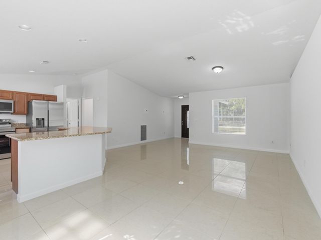 14242 77th Place N, The Acreage, FL 33470