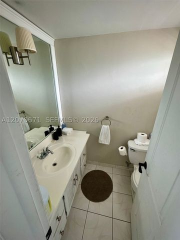 450 Golden Isles Dr 2F, Hallandale Beach, FL 33009