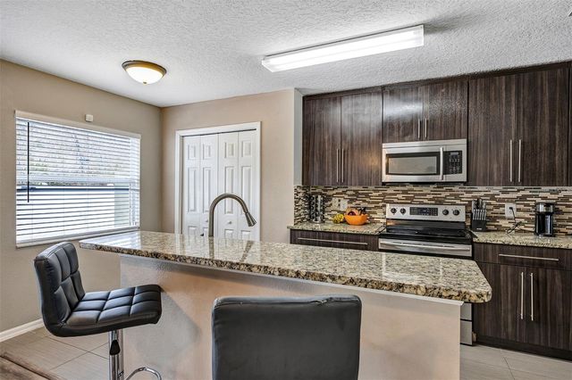 688 CRESTING OAK CIRCLE 48, Orlando, FL 32824