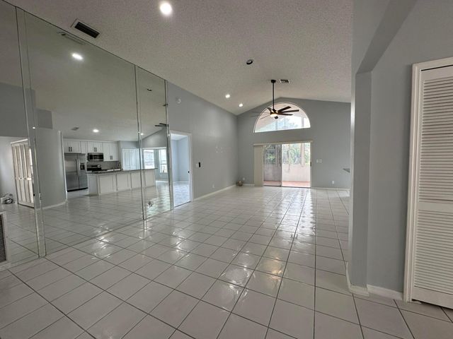 119 Hammocks Court, Greenacres, FL 33413