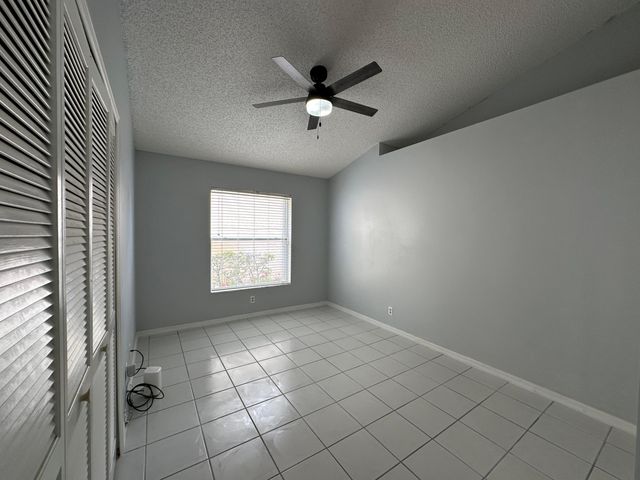 119 Hammocks Court, Greenacres, FL 33413