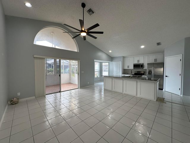 119 Hammocks Court, Greenacres, FL 33413