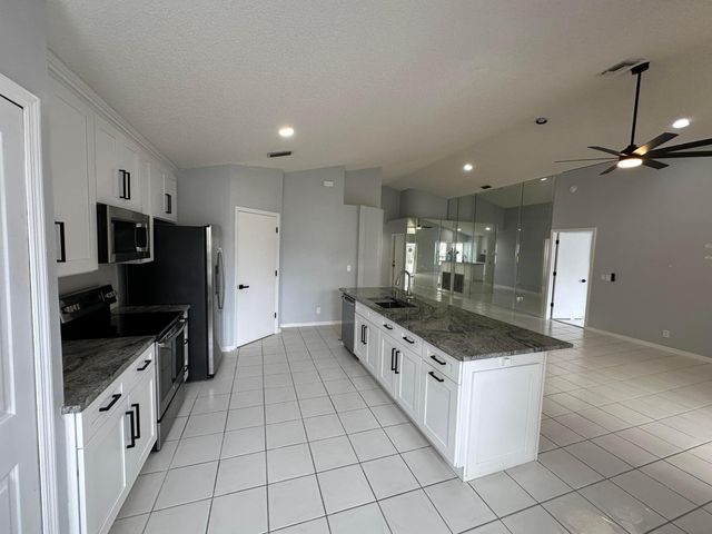 119 Hammocks Court, Greenacres, FL 33413