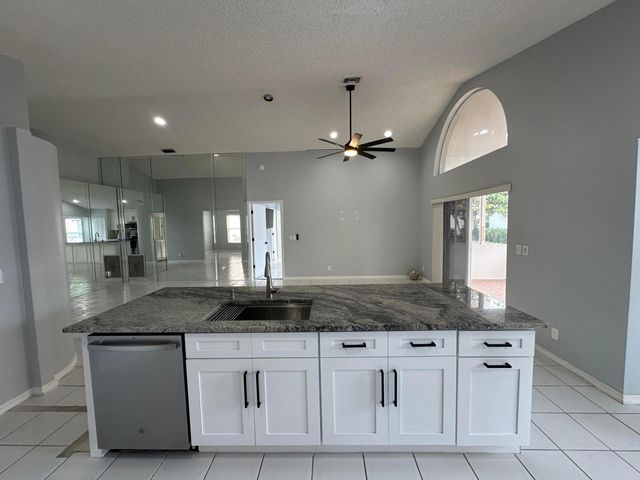 119 Hammocks Court, Greenacres, FL 33413