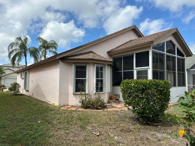 119 Hammocks Court, Greenacres, FL 33413