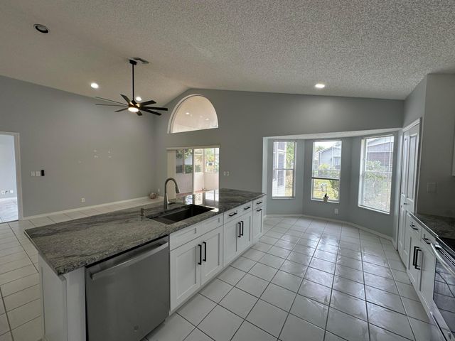 119 Hammocks Court, Greenacres, FL 33413