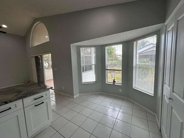 119 Hammocks Court, Greenacres, FL 33413