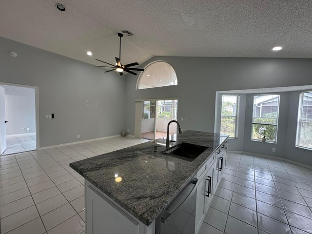 119 Hammocks Court, Greenacres, FL 33413