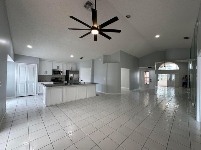 119 Hammocks Court, Greenacres, FL 33413