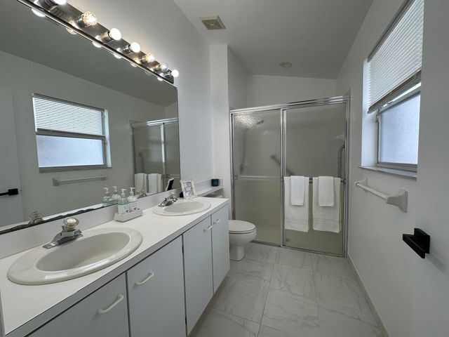 119 Hammocks Court, Greenacres, FL 33413