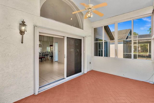 119 Hammocks Court, Greenacres, FL 33413