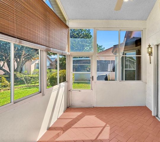 119 Hammocks Court, Greenacres, FL 33413