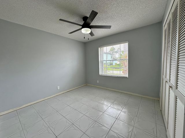 119 Hammocks Court, Greenacres, FL 33413