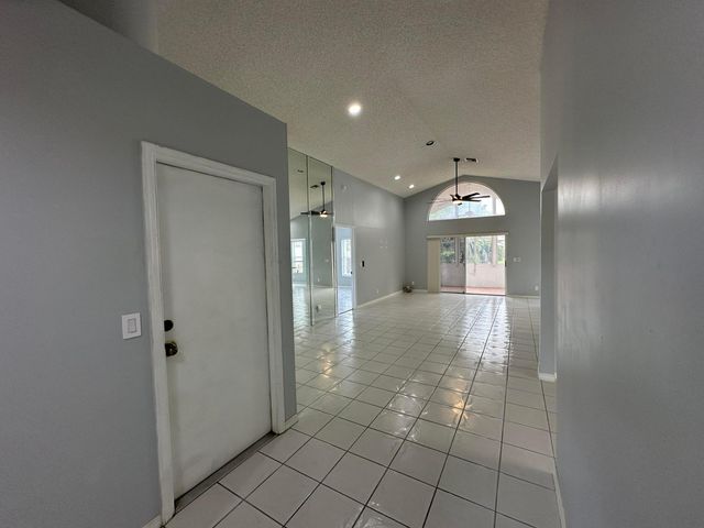 119 Hammocks Court, Greenacres, FL 33413